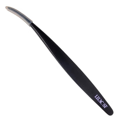 Lilac St. lash applicator with ergonomic curved end for precise lash placement.