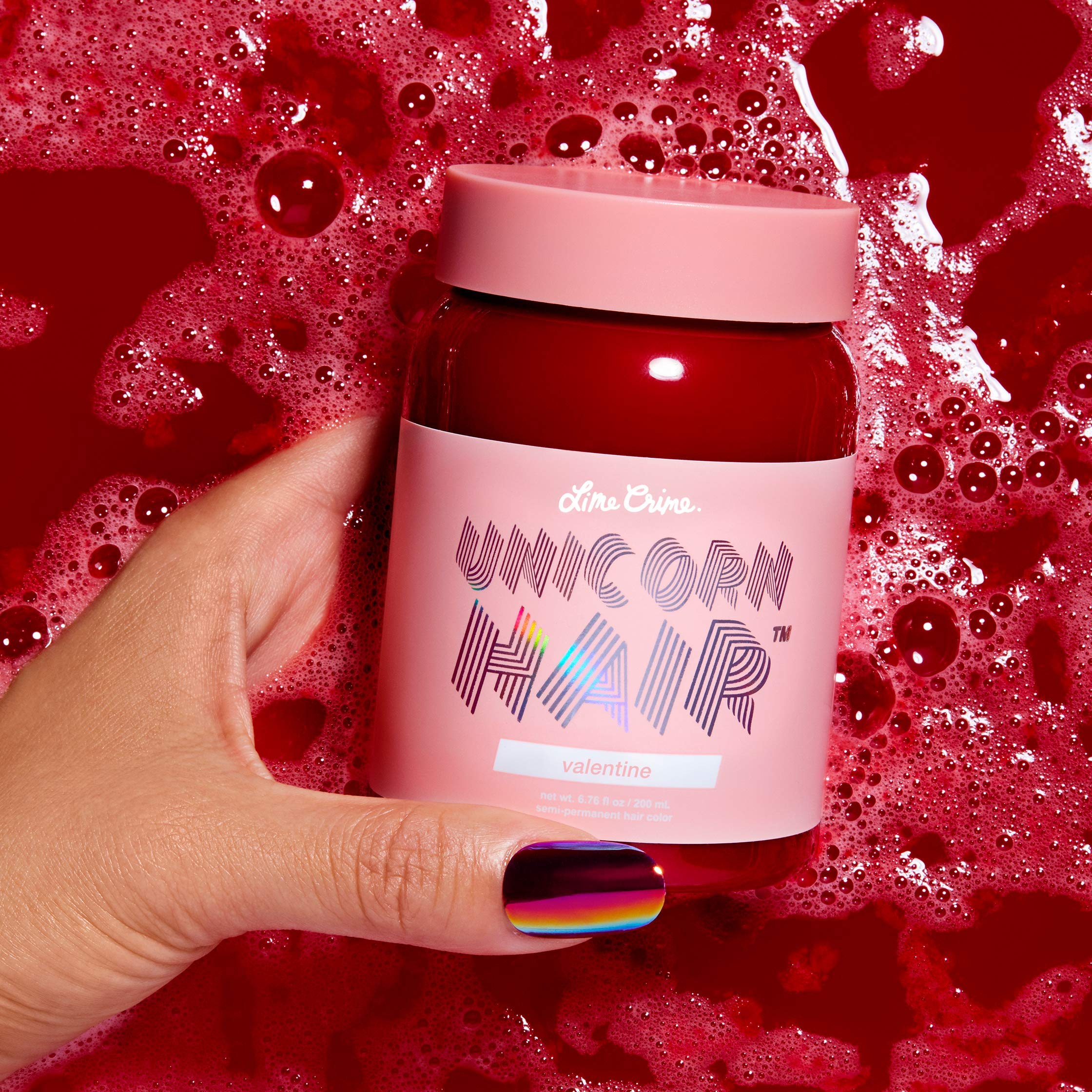 Lime Crime Unicorn Hair Dye Valentine applicator gloves illustrate mess-free application.