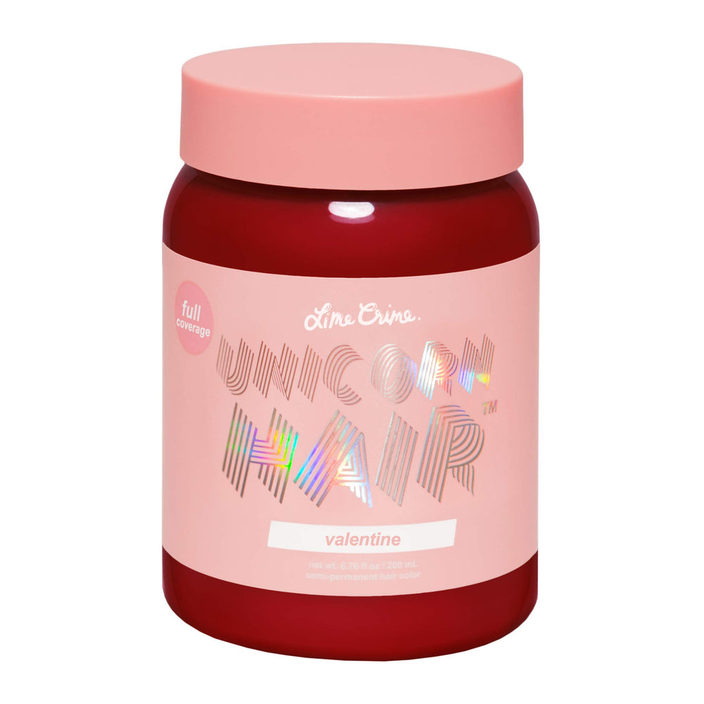 Lime Crime Unicorn Hair Dye Valentine bottle close-up shows vibrant crimson shade for bold looks.