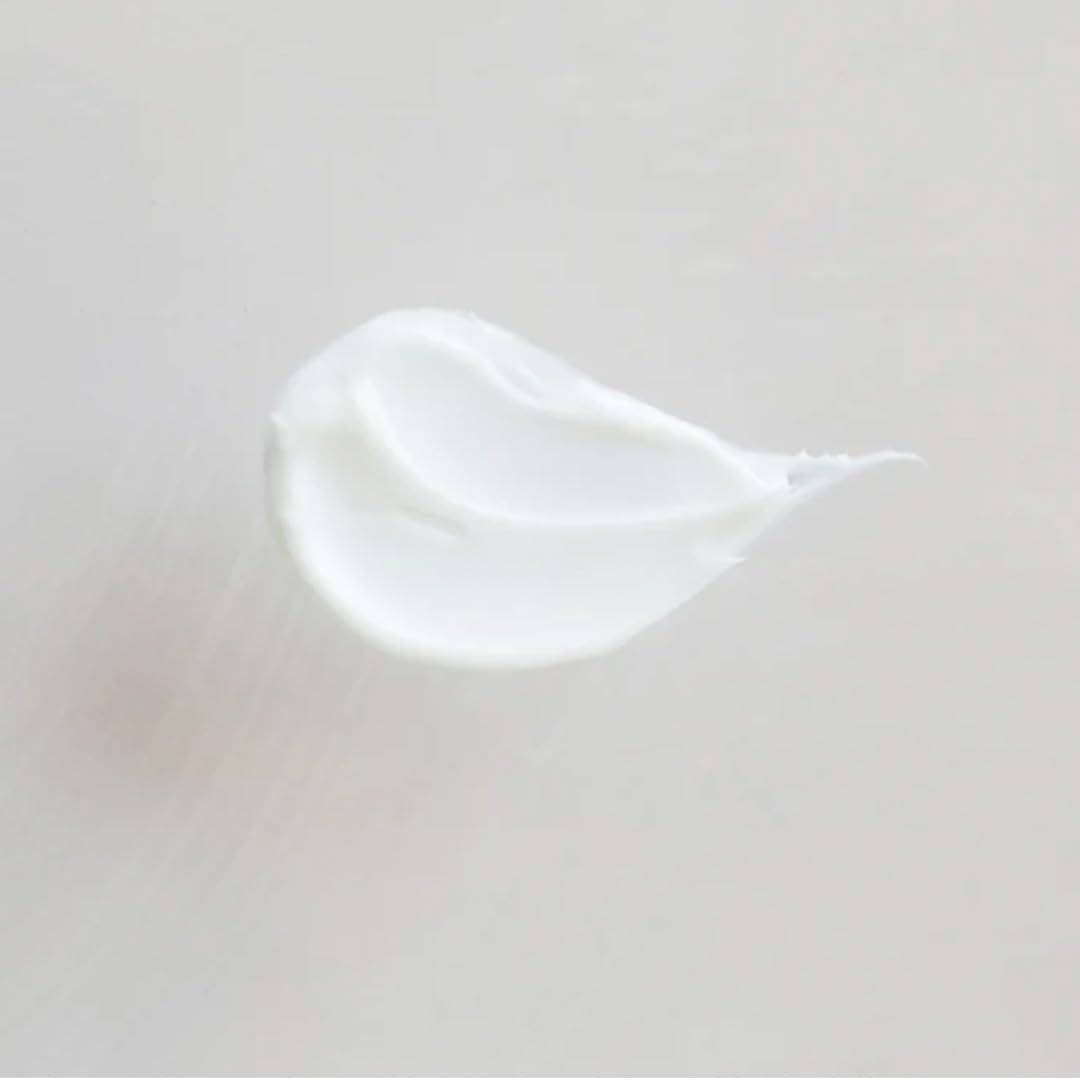 Little Seed Farm argan oil bottle close-up emphasizing natural formula.