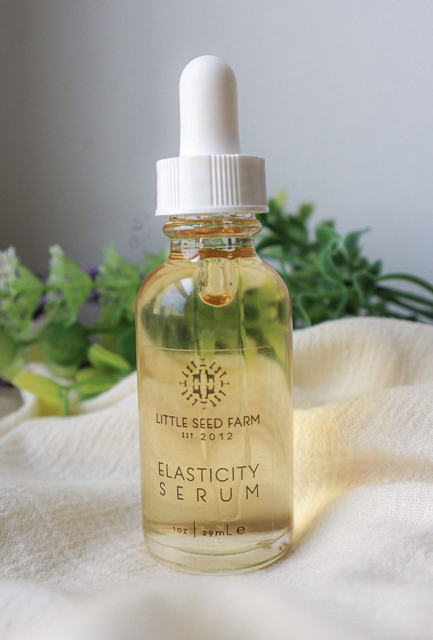 Little Seed Farm Elasticity Serum pump indicates easy daily application and quick absorption.