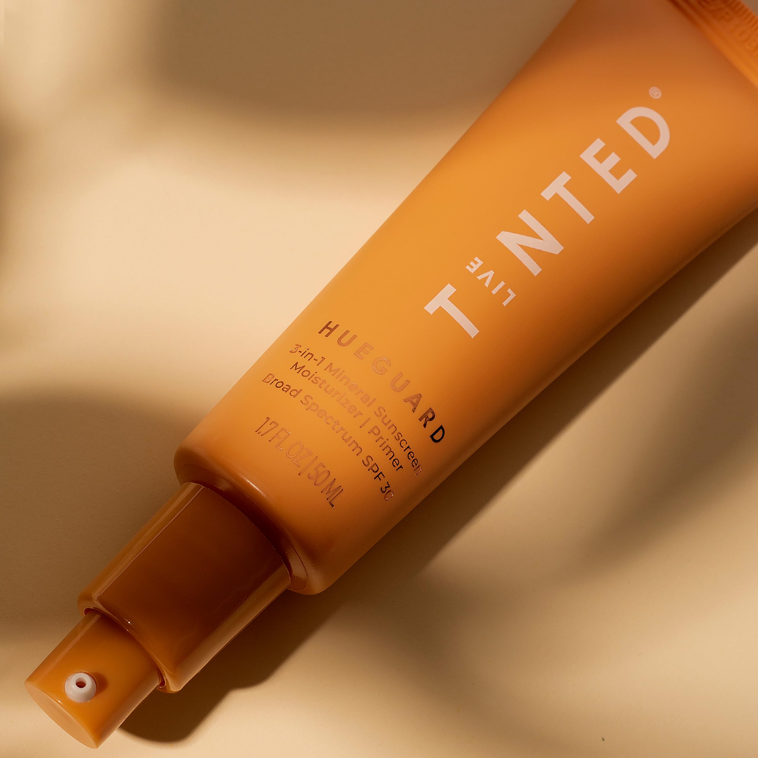 Hueguard Mini compact under makeup shows smooth, prep-ready skin