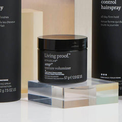 Living Proof Amp Texture Volumizer finished style with lifted, soft hair.