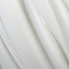 Living Proof Curl Conditioner detangling action demonstrates high slip that reduces snagging.