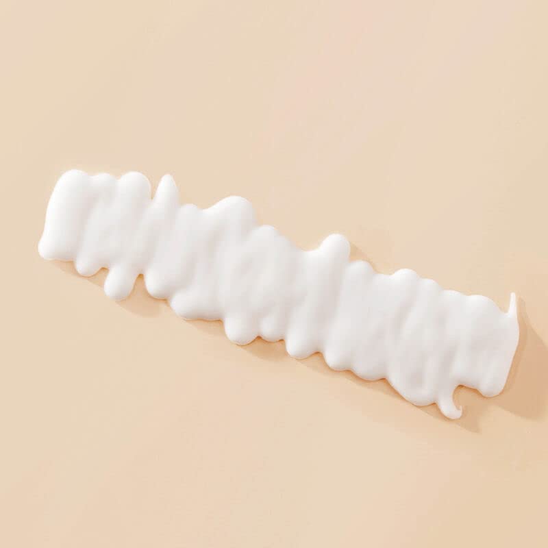 Living proof curl definer curls closeup highlighting bouncy, frizz-free shine.