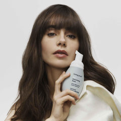 Living Proof Full Texturizing Foam on wet hair ready for volumizing styling