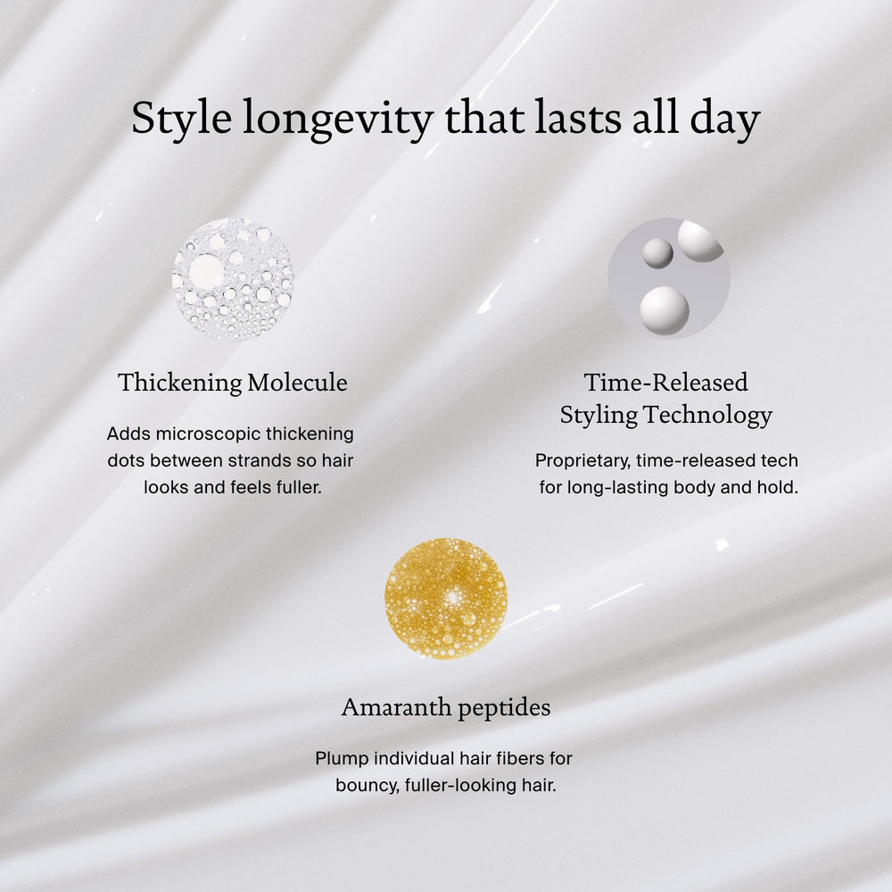 Living Proof Full Thickening Blow-Dry Cream applied on damp hair for even distribution.