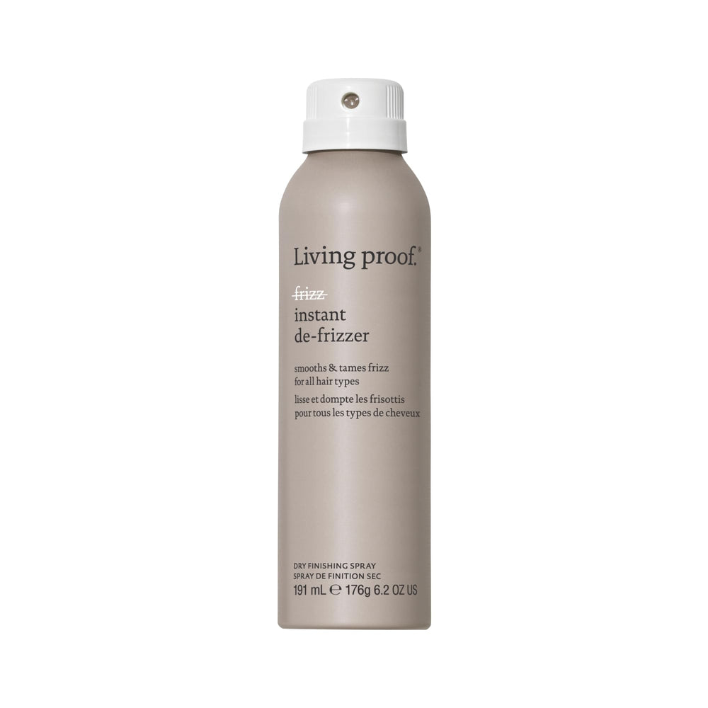 Living Proof No Frizz Instant De-Frizzer bottle with pump delivering lightweight frizz control on dry hair.