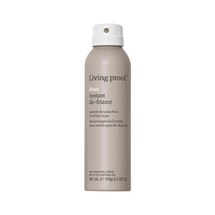 Living Proof No Frizz Instant De-Frizzer bottle with pump delivering lightweight frizz control on dry hair.