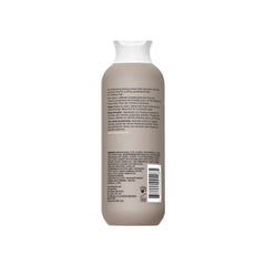 Living Proof No Frizz Smooth Styling Cream texture close-up for easy application