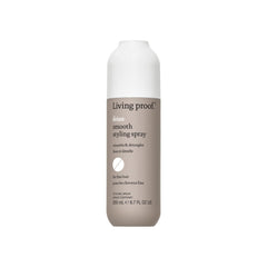 Living Proof No Frizz Smooth Styling Spray bottle demonstrates lightweight frizz control for fine hair.