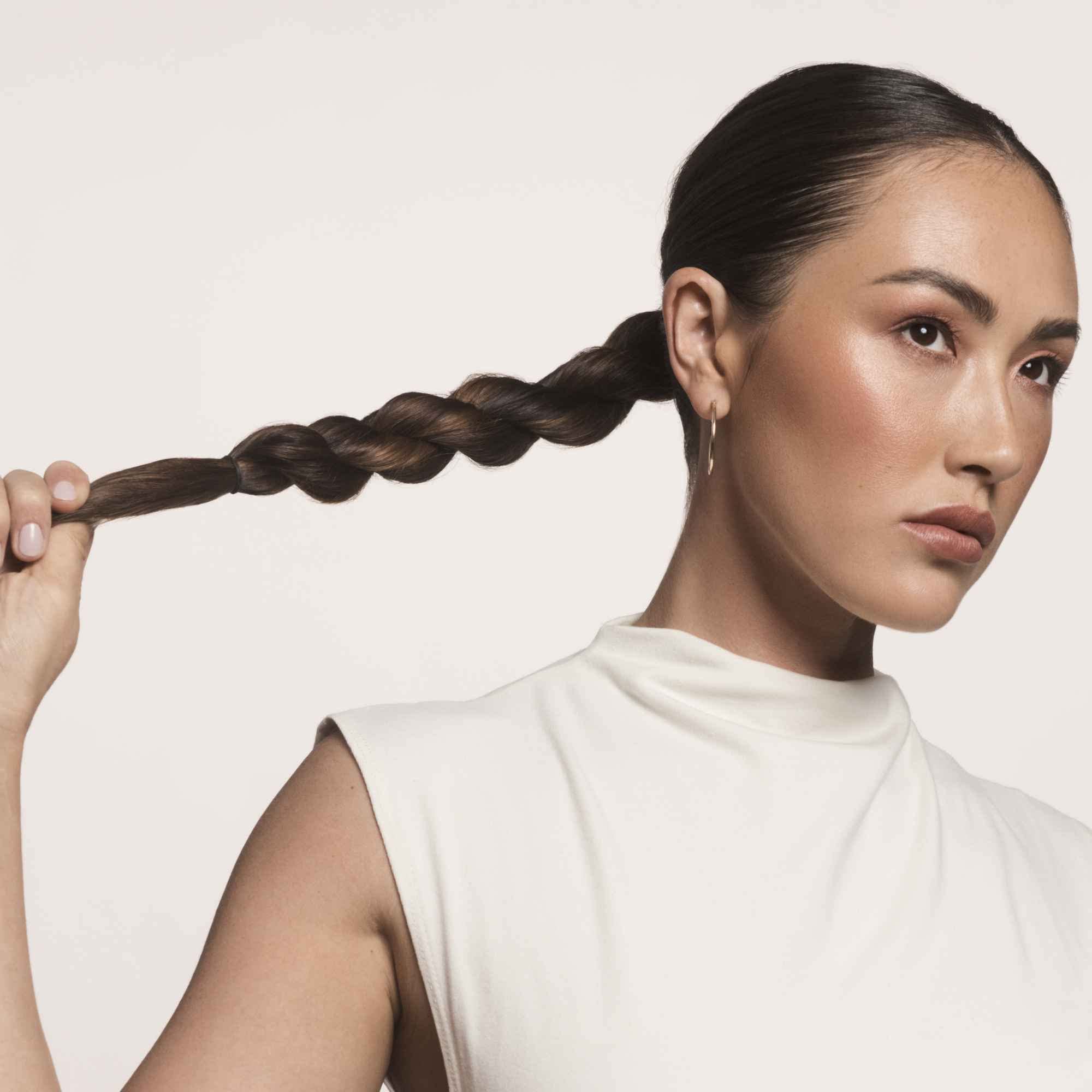 Living Proof No Frizz Smooth Styling Spray heat protection for safe blow-drying and styling.