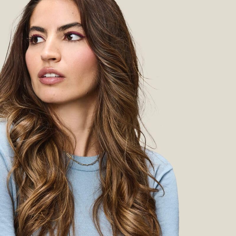 Living Proof Perfect Hair Day shine-on-hair captures visible luminosity and healthy polish.