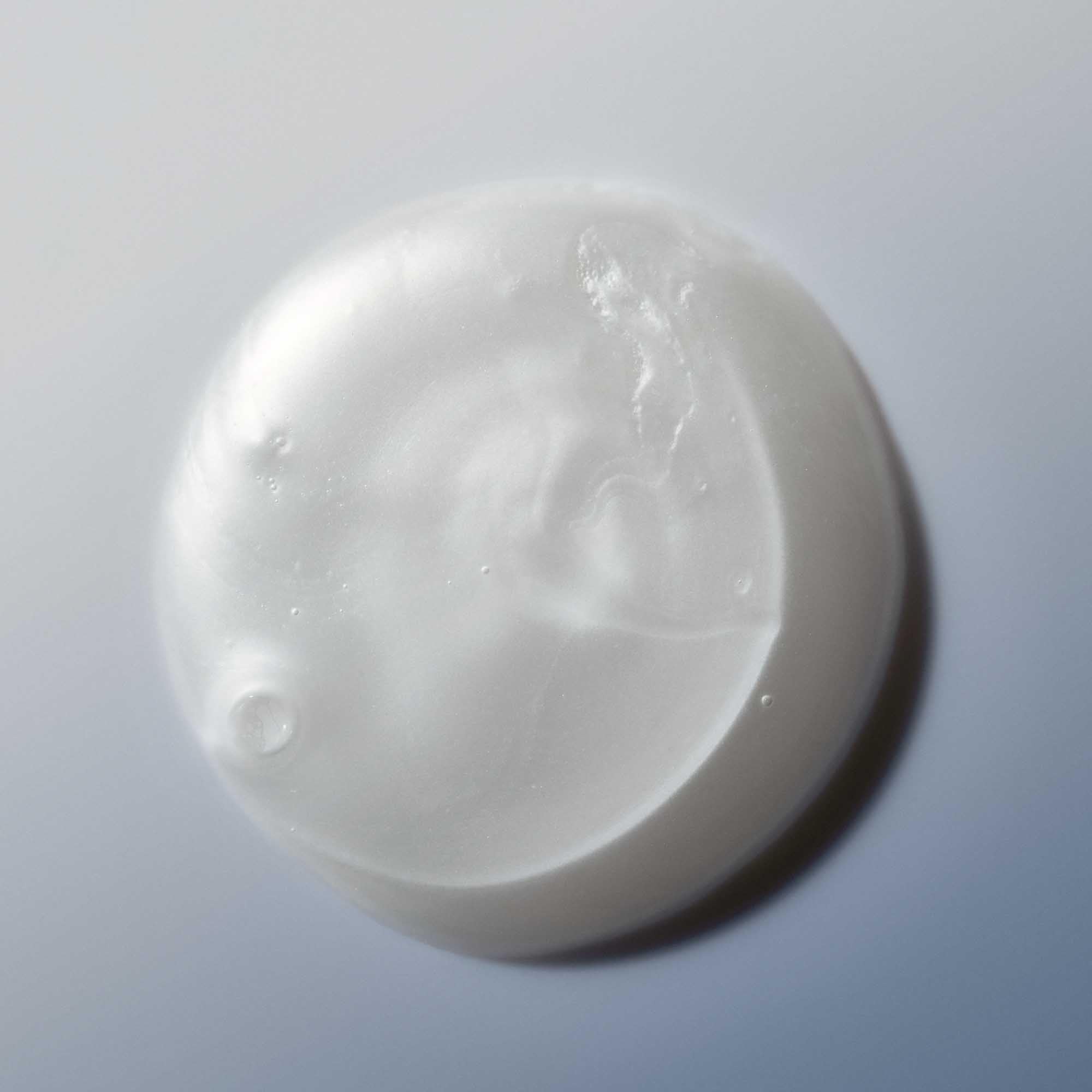 Living Proof Restore Shampoo bottle at an angle showing premium packaging and branding