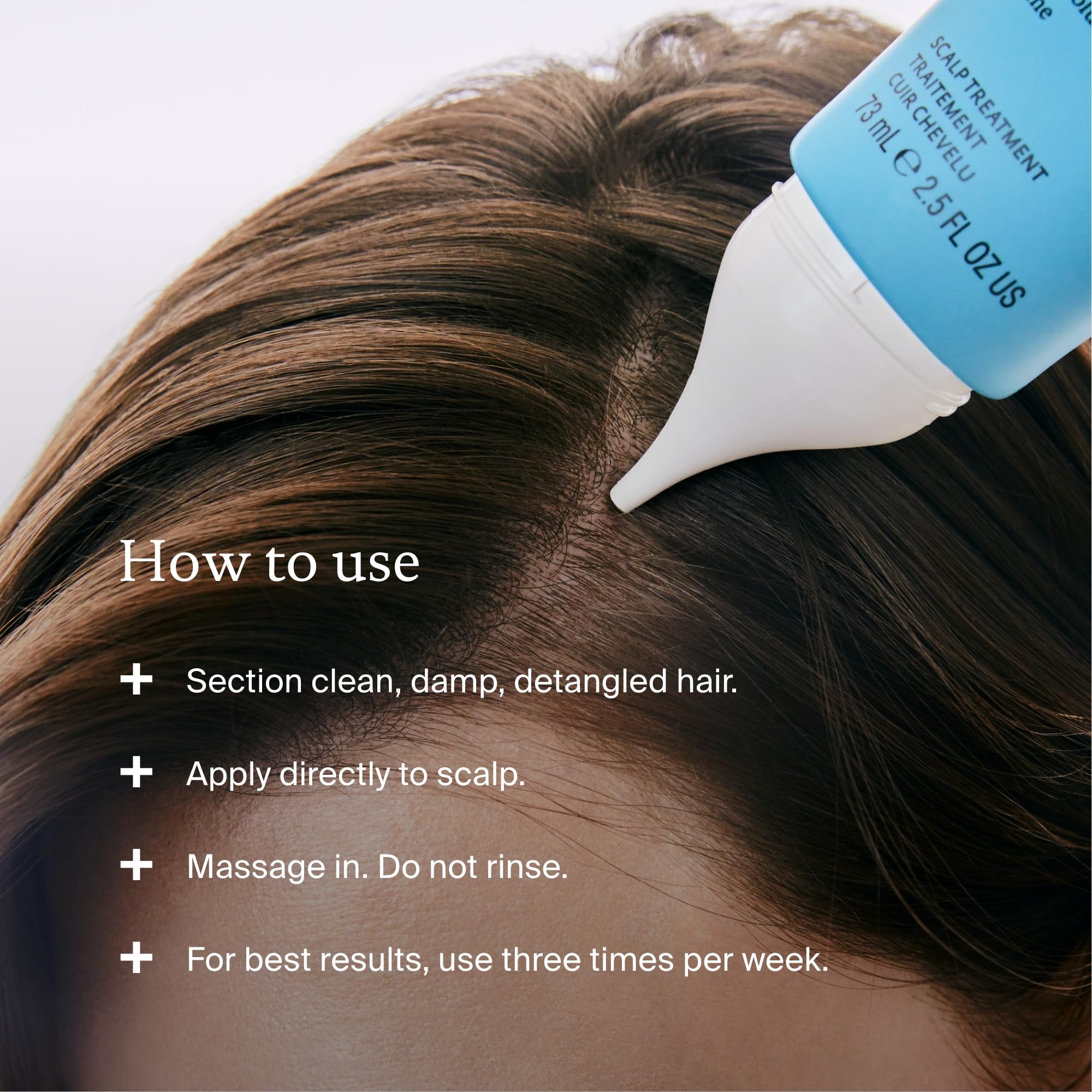 Living Proof application on scalp demonstrates targeted leave-in relief.