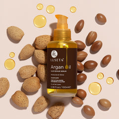 L LUSETA Argan Oil Hair Serum applied to damp hair for smoothing.