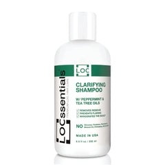 LOCssentials clarifying shampoo bottle angle demonstrates residue-free cleansing for locs and protective styles.