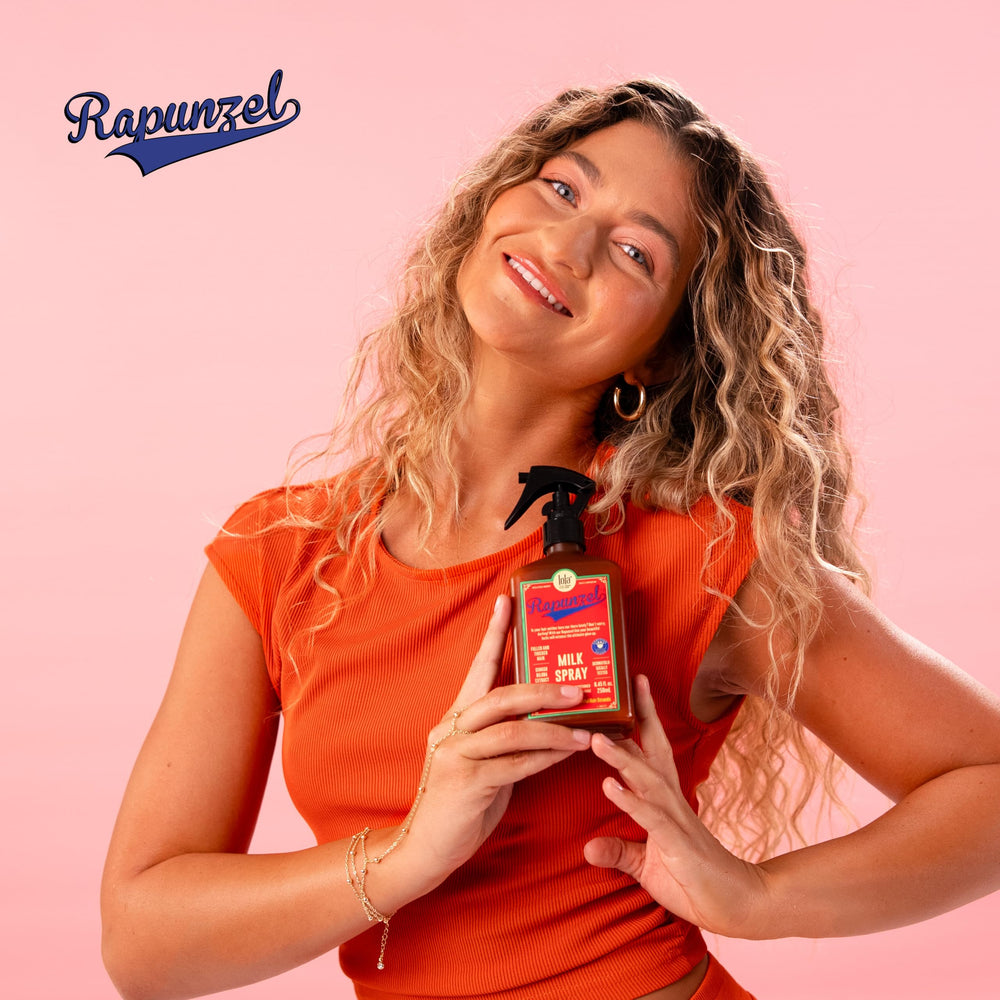 Lola From Rio detangler spray easing knots during brushing.
