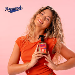 Lola From Rio detangler spray easing knots during brushing.