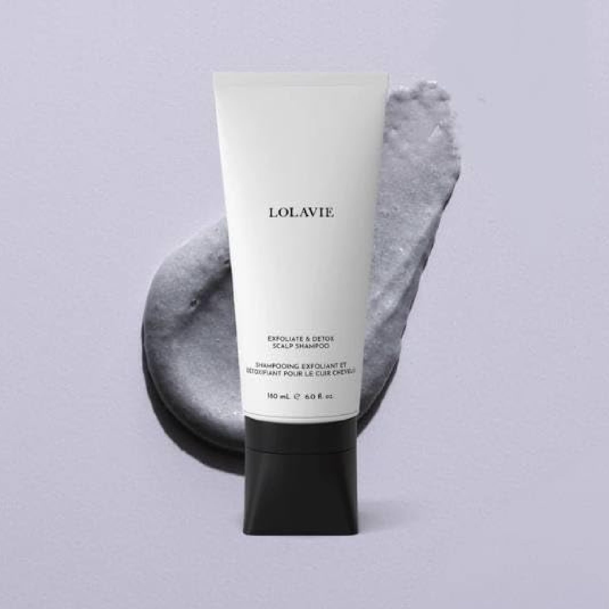 LolaVie Exfoliate & Detox texture close-up shows a creamy scrub for gentle exfoliation.