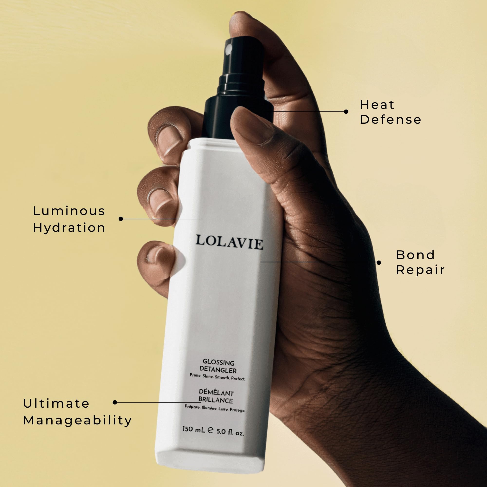 LolaVie Glossing Detangler spray-on action on wet hair for smooth detangling