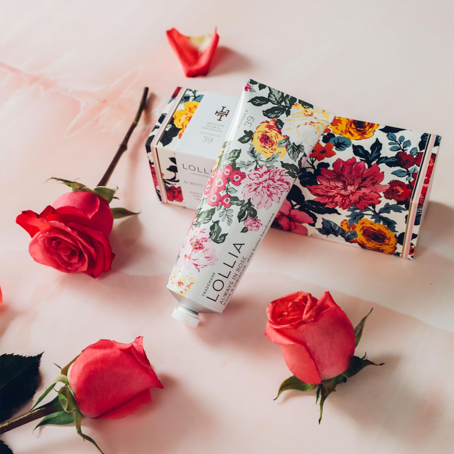 Applying LOLLIA handcreme for quick absorption and petal-soft skin