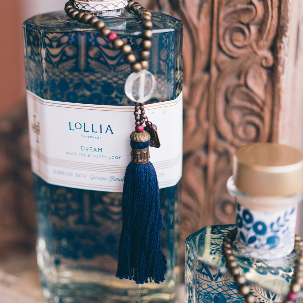 Lollia Dream Bubble Bath lavender honey fragrance evokes tranquil bath time ritual.
