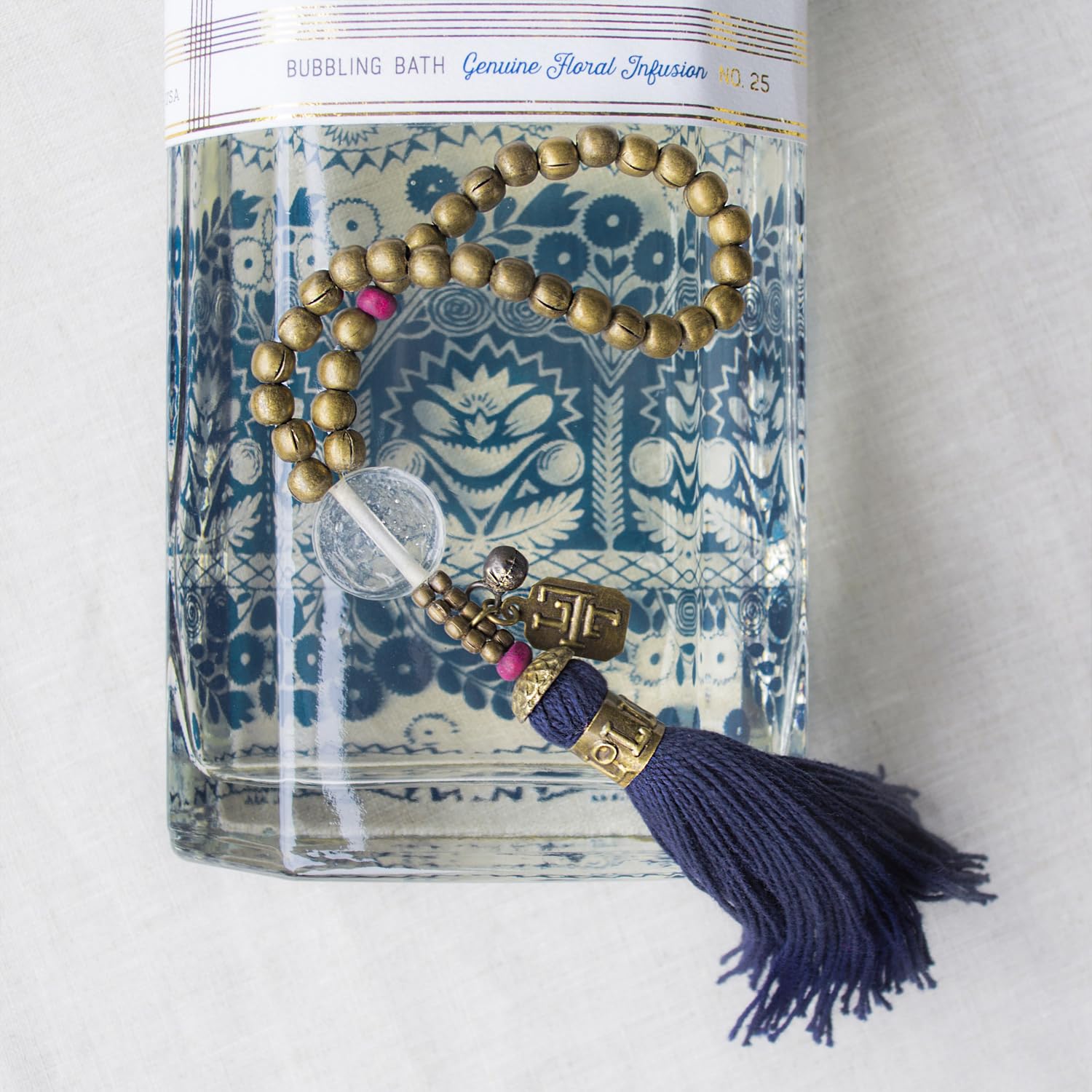 Lollia Dream Bubble Bath label displays White Tea & Honeysuckle scent profile.