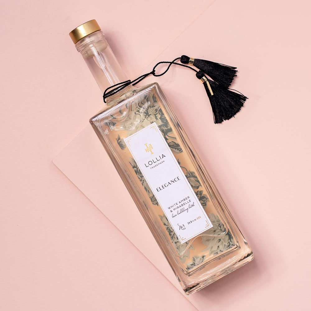 LOLLIA Elegance bubbles foaming in tub for a soothing, skin-softening bath experience.