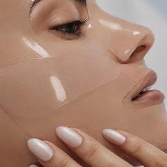 LOOPS DREAM SLEEP on face in bed illustrating overnight skincare ritual
