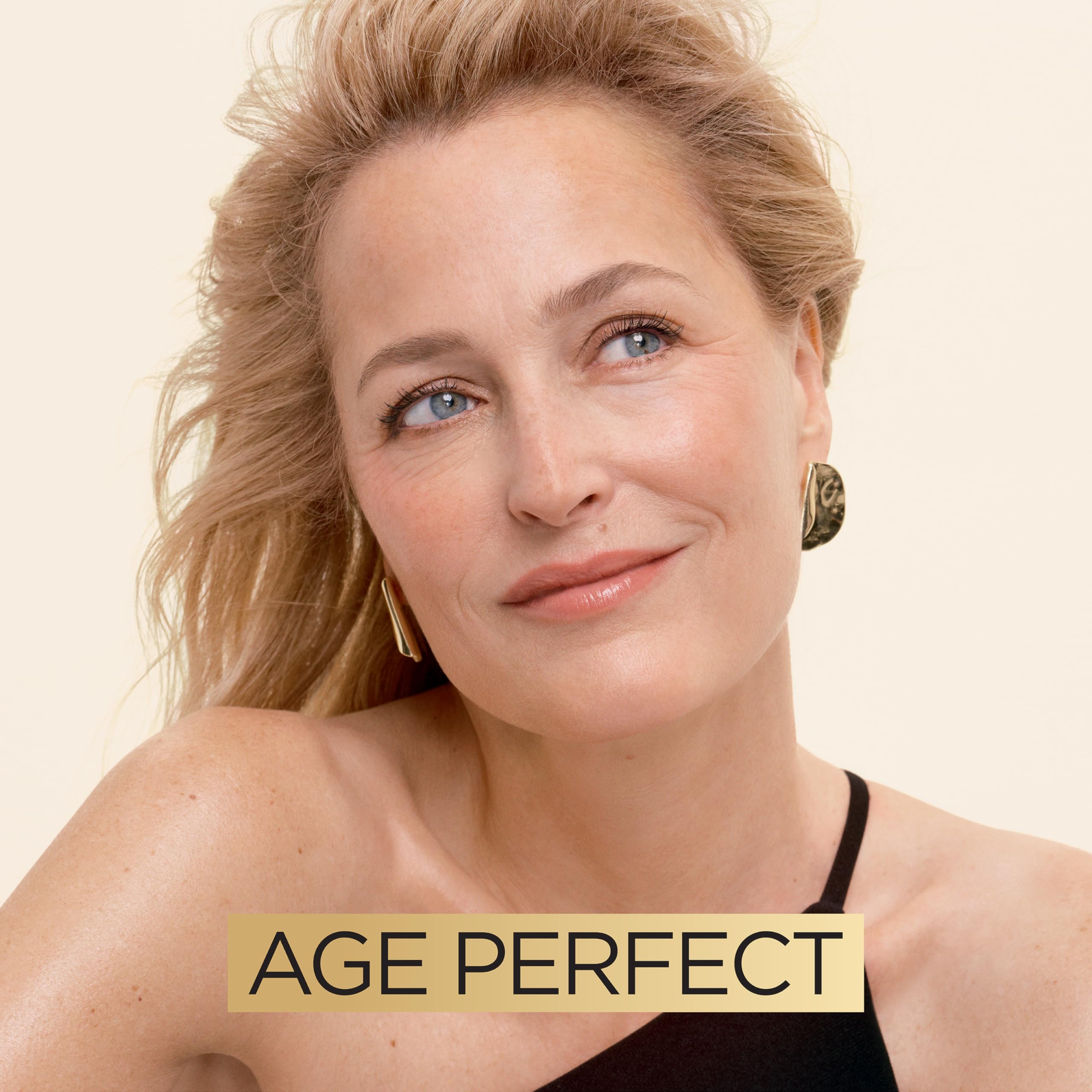 L'Oreal Paris Age Perfect night cream application swirl for smooth hydration.