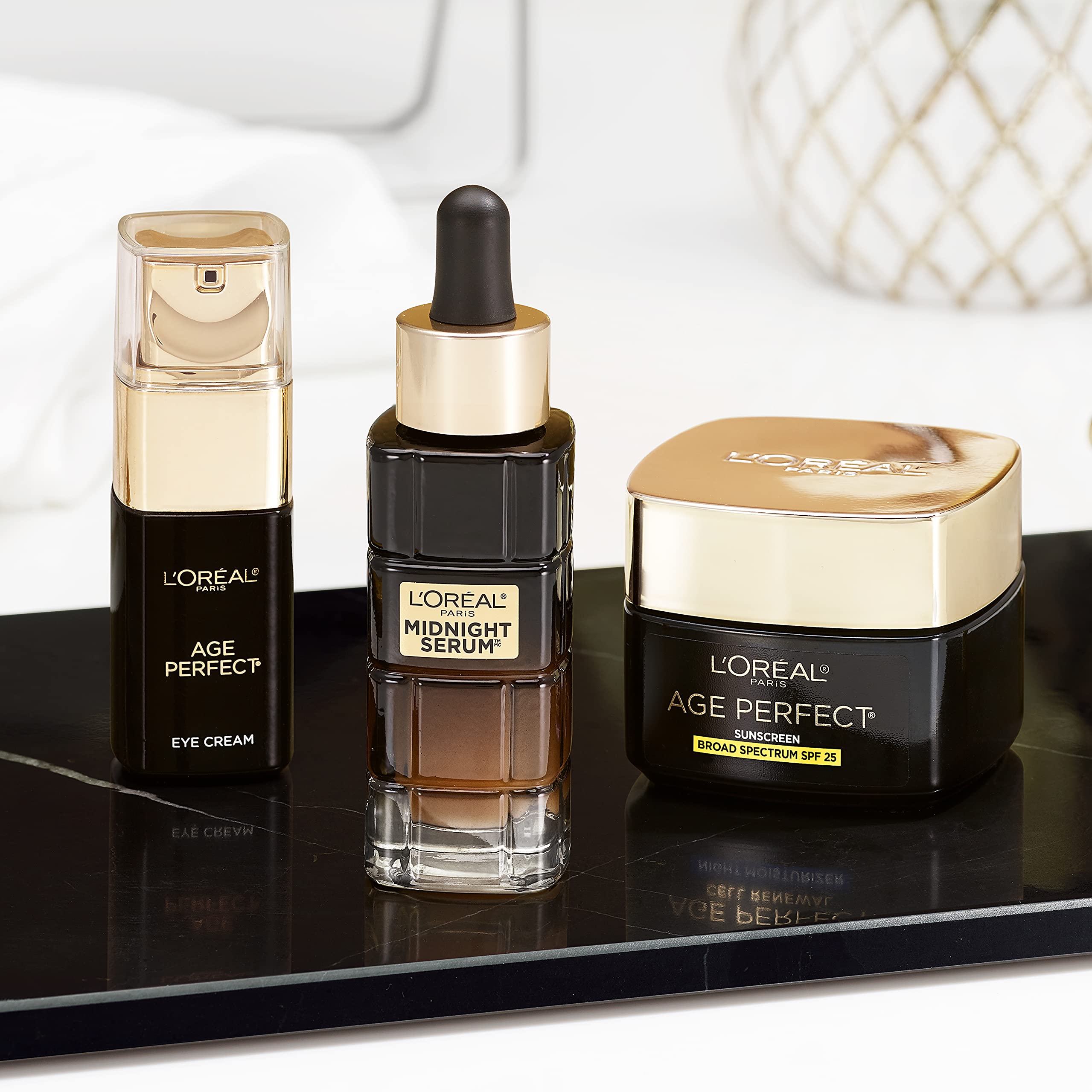 L'Oreal Paris Age Perfect Cell Renewal cream texture swatch showing non-greasy finish.