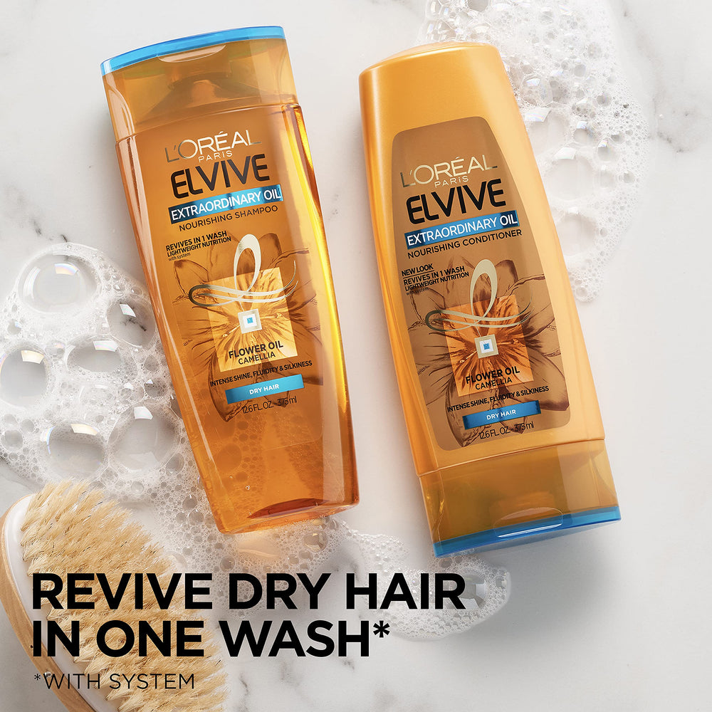 L'Oreal Paris Elvive Extraordinary Oil Conditioner dispenses product smoothly for quick detangling prep.