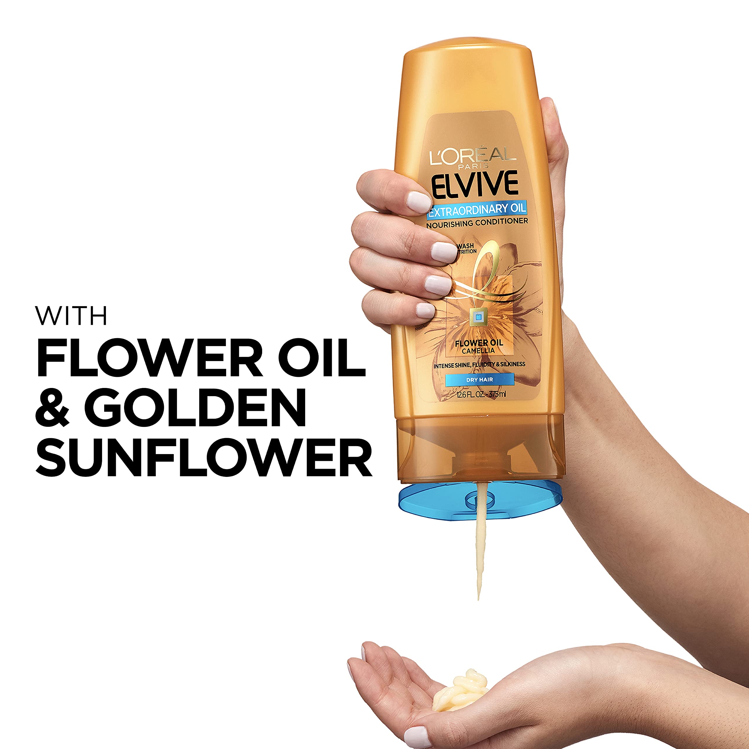 L'Oreal Paris Elvive Extraordinary Oil Conditioner texture visible on hair promises softness without heaviness.