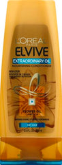 L'Oreal Paris Elvive Extraordinary Oil Conditioner close-up label highlights lightweight nourishing oils.