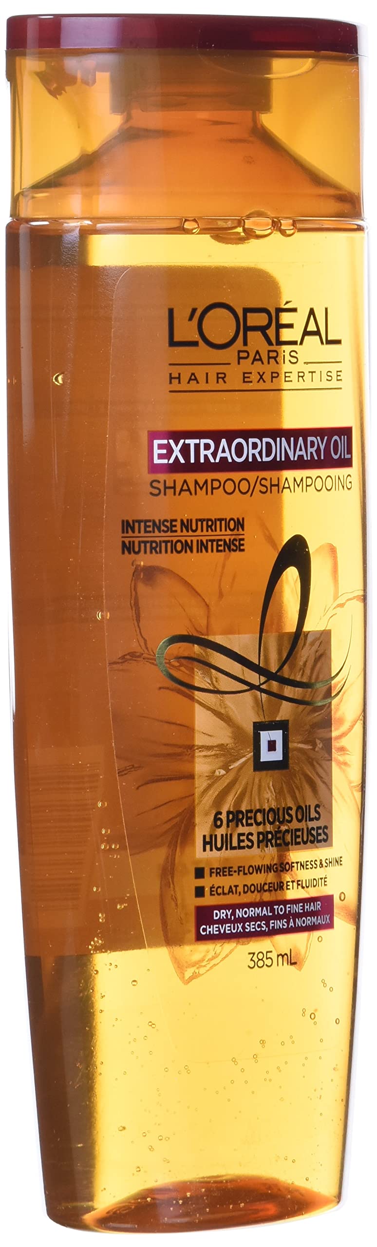 L'Oreal Paris Extraordinary Oil Shampoo wet-hair application shows even lather.