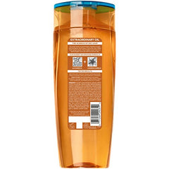 L'Oreal Paris Extraordinary Oil Shampoo label closeup emphasizes luscious oils for softness.
