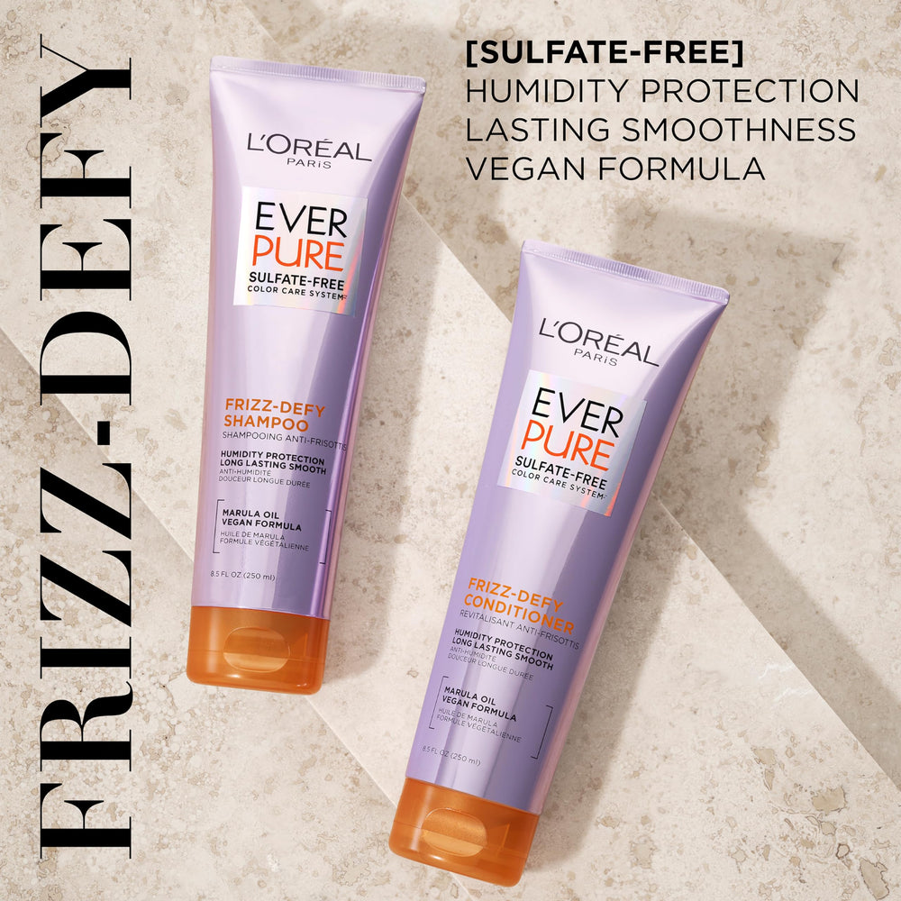 L'Oreal Paris Frizz Defy conditioner bottle for smoother, manageable hair.