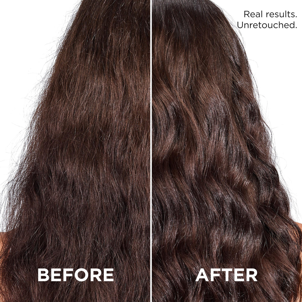 L'Oreal Paris Marula Oil in amber bottle offering nourishing shine.