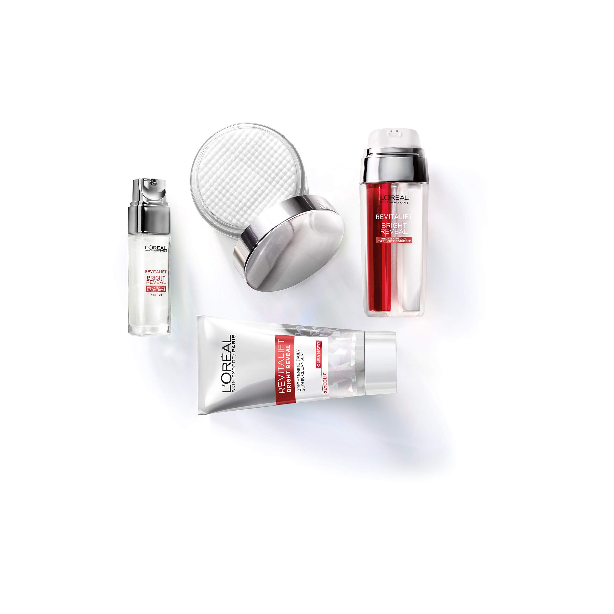 L’Oréal Paris Revitalift Bright Reveal SPF 30 tube sits beside skincare lineup for morning routine