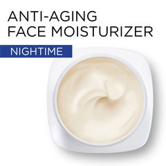 L'Oreal Paris Revitalift night cream being applied during night routine suggests softening benefits