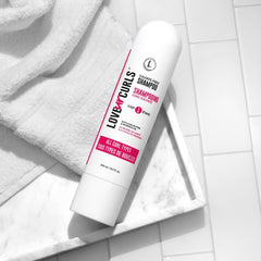 Love Ur Curls conditioner bottle closeup highlights detangling and hydration