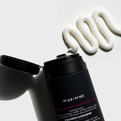 Creamy deep conditioner texture on hair for hydration and slip