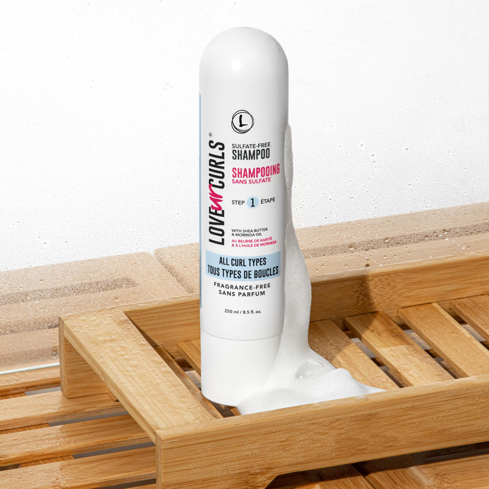 Love Ur Curls fragrance-free shampoo bottle closeup highlights vegan, silicone-free care.
