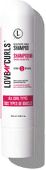 Love Ur Curls Shampoo bottle closeup demonstrates gentle cleansing for curly hair