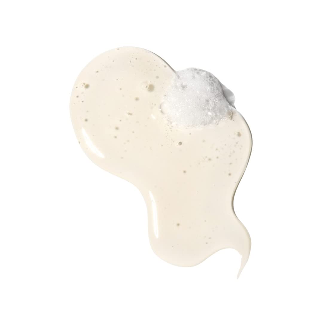 Love Ur Curls Shampoo bottle with rich lather communicates sulfate-free cleansing