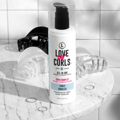 Love Ur Curls soft defined curly hair closeup reveals smooth, bouncy coils