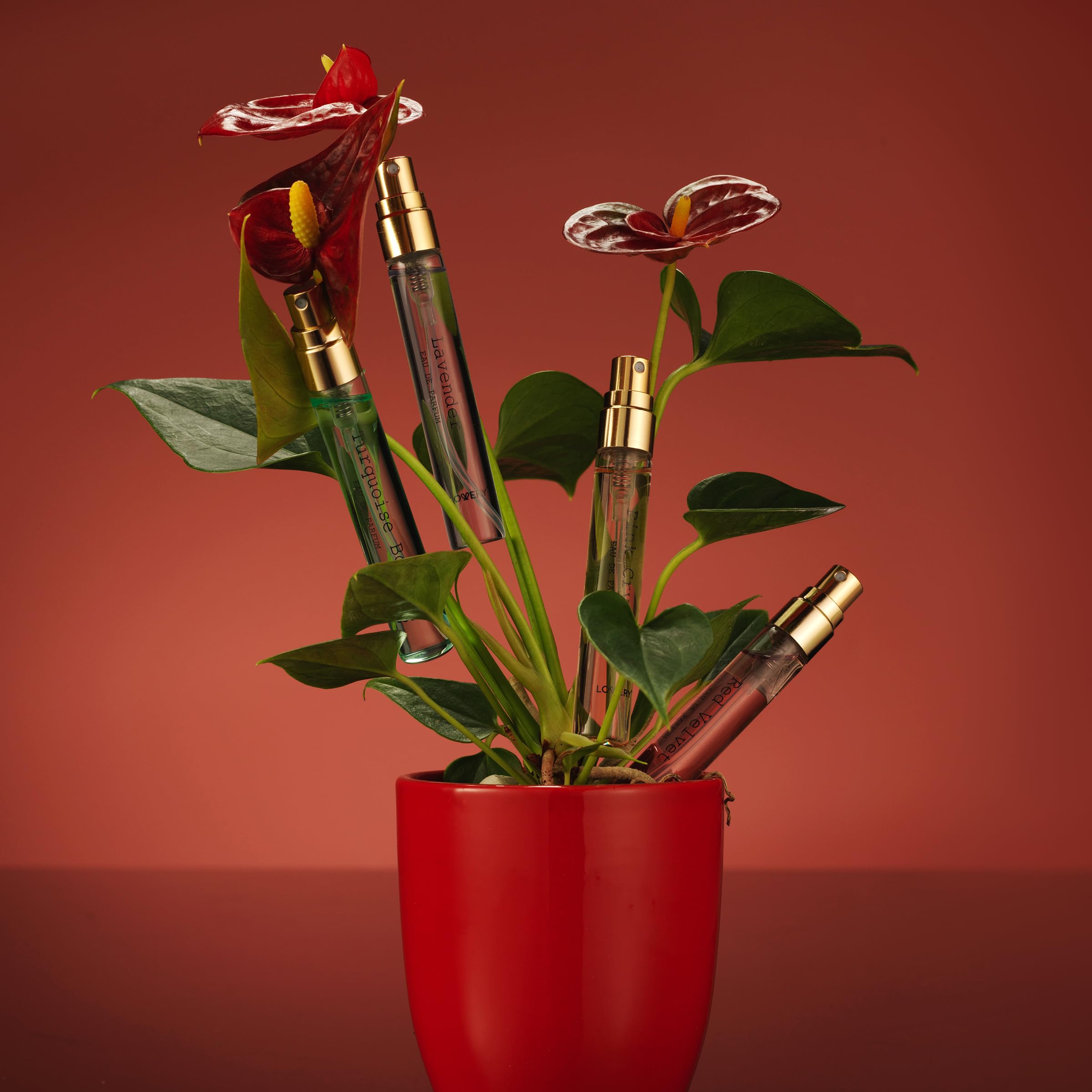 Lovery Blossom Bomb fragrance bottle with White Diamond option to elevate a look.