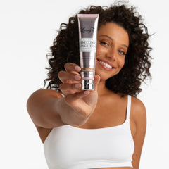 Loving Tan Deluxe Face Self Tanner cream texture ready for smooth, even application on skin.