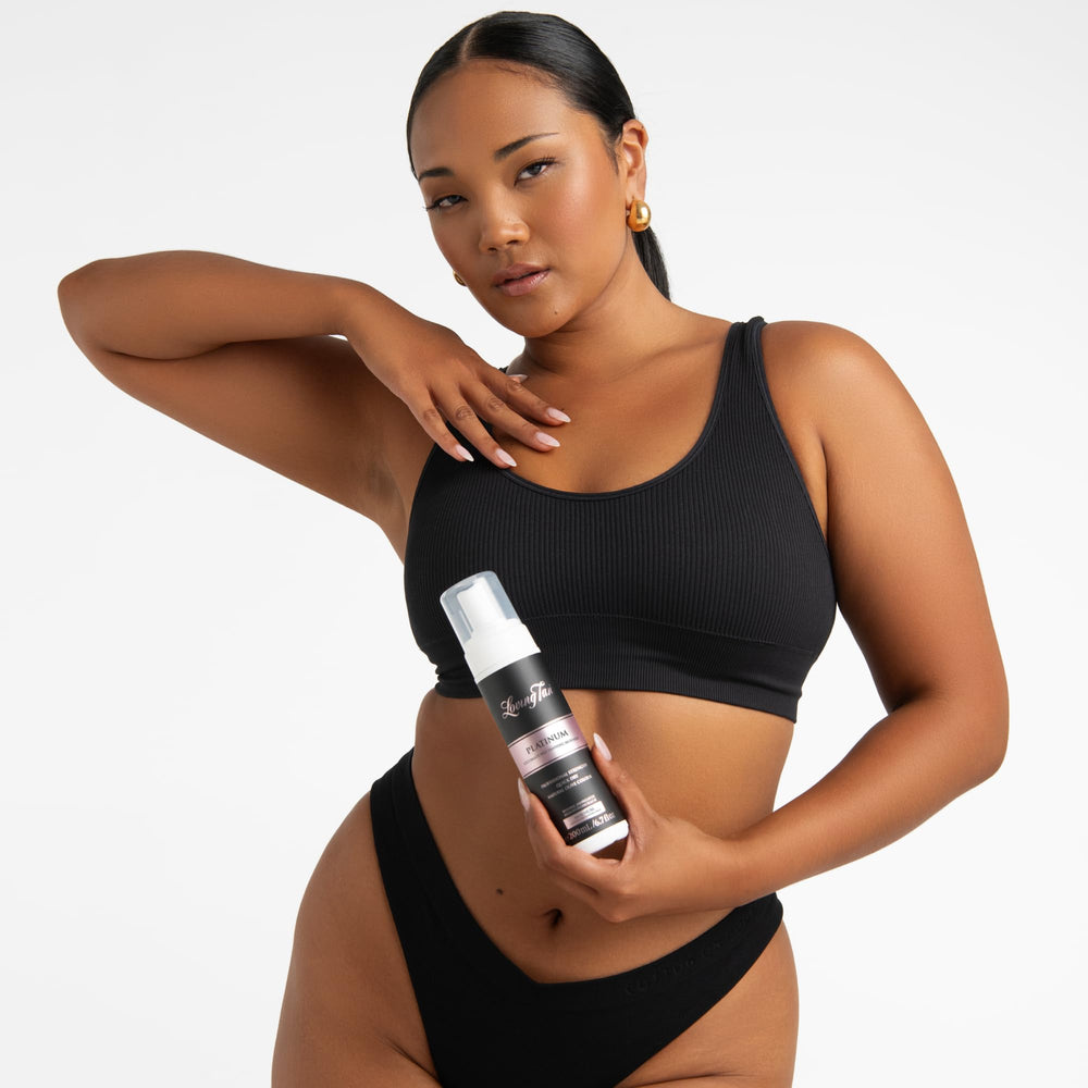 Loving Tan Platinum Mousse texture close-up shows airy, quick-drying foam.